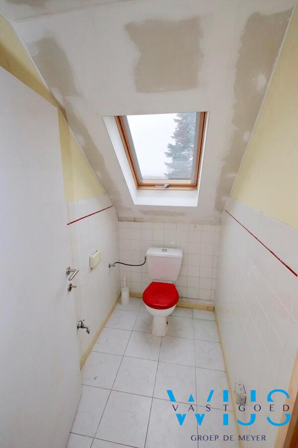 Woning met 2 entiteiten (MOGELIJKHEDEN) en garage in centrum ASSENEDE! 