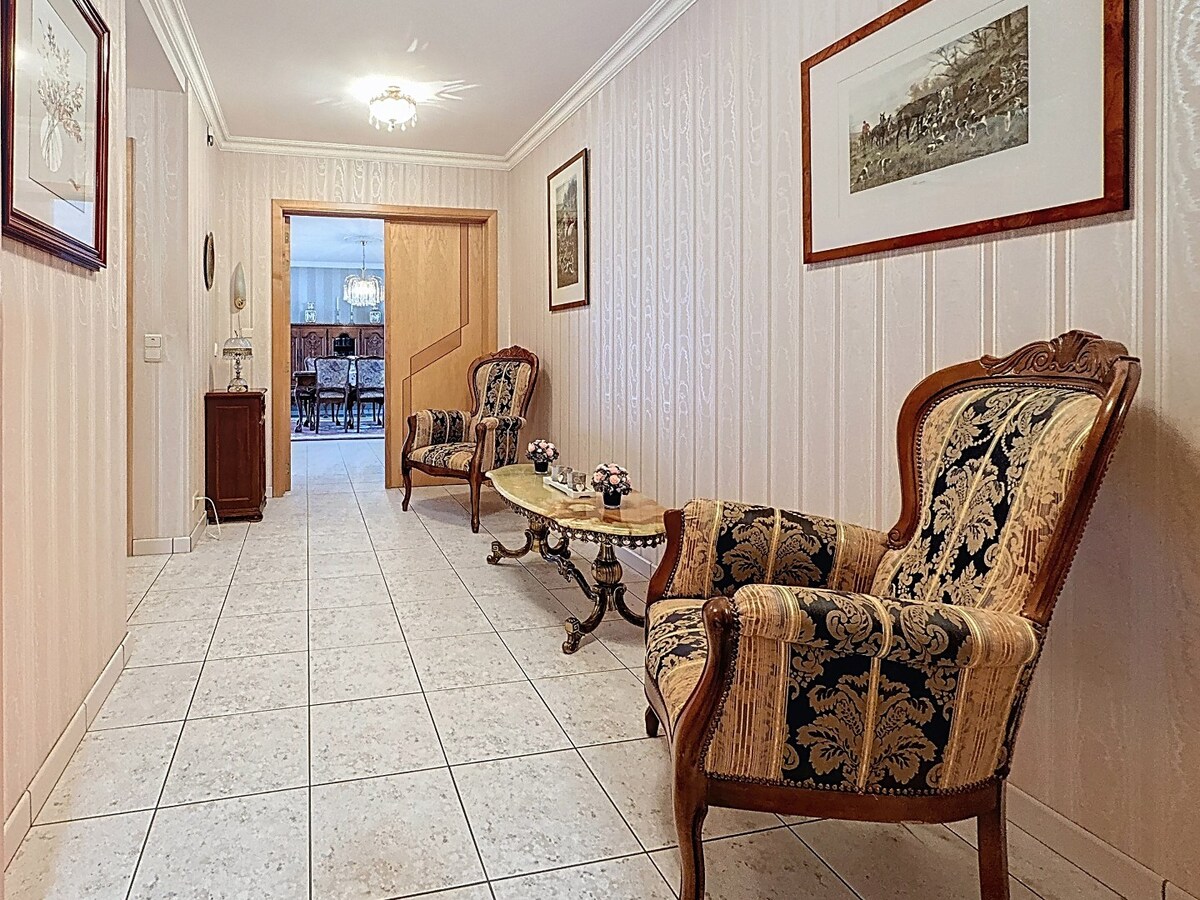 Energiezuinig gelijkvloersapp. met tuintje en garage te centrum Wetteren 