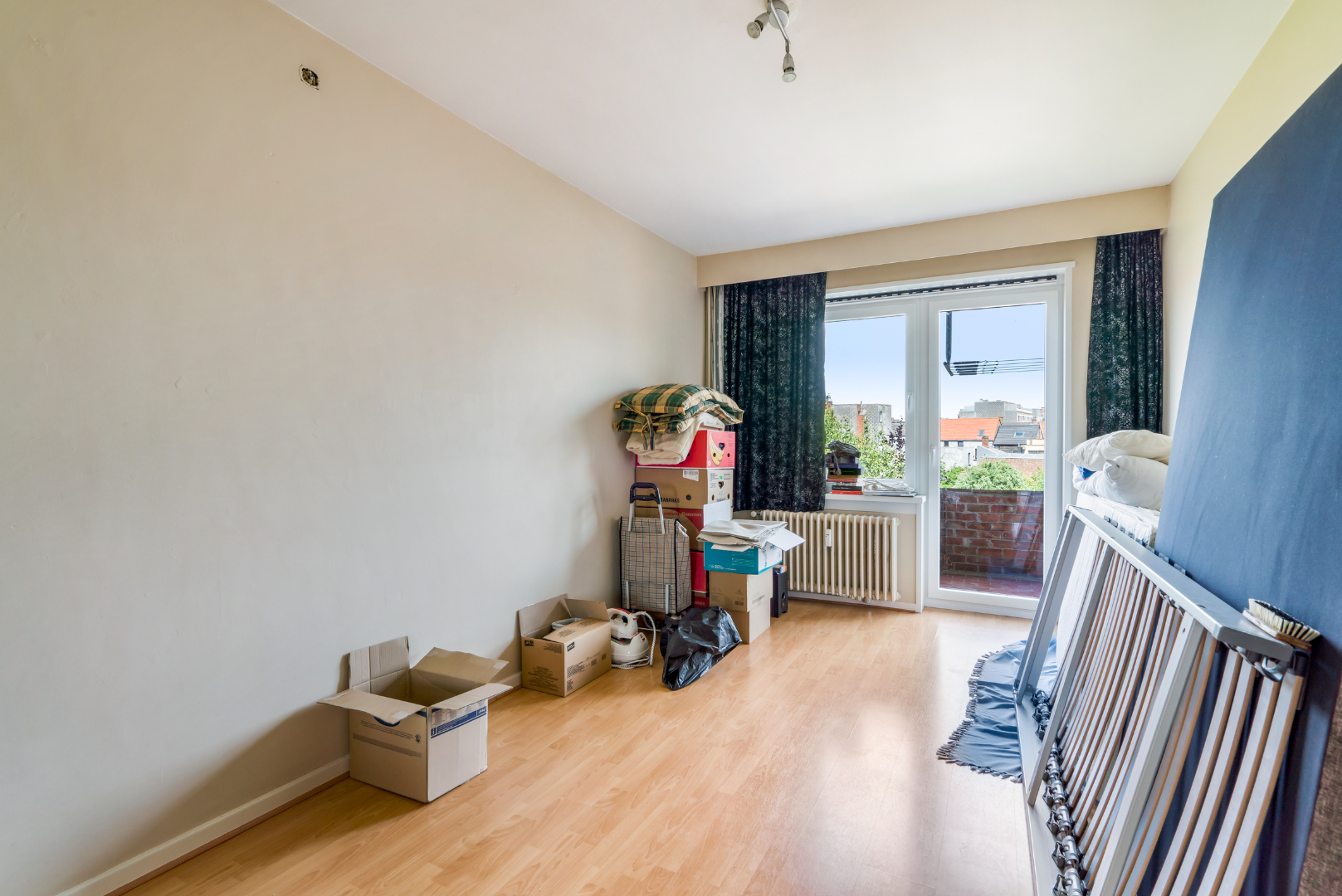 OPBRENGSTEIGENDOM MET 7 APPARTEMENTEN EN 7 GARAGEBOXEN 