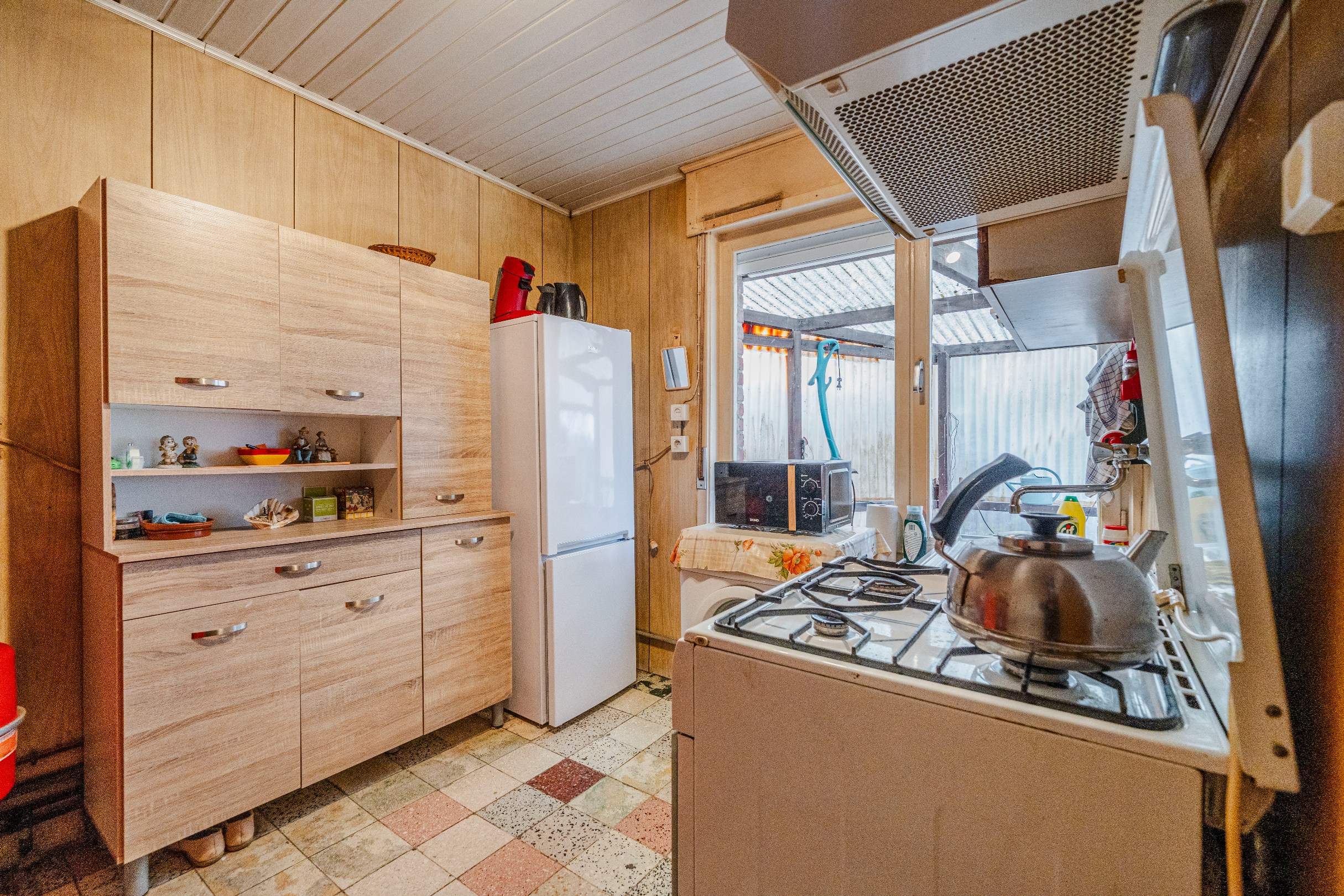 Halfopen bebouwing met 3 slaapkamers, tuin en garage. 