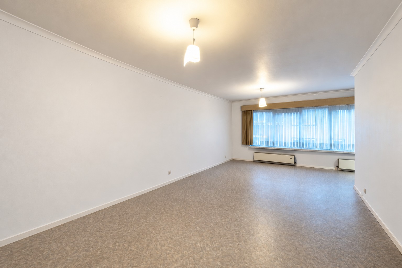 Lichtrijk appartement met 2 slaapkamers en zuidoostgericht terras nabij Gent-Dampoort 