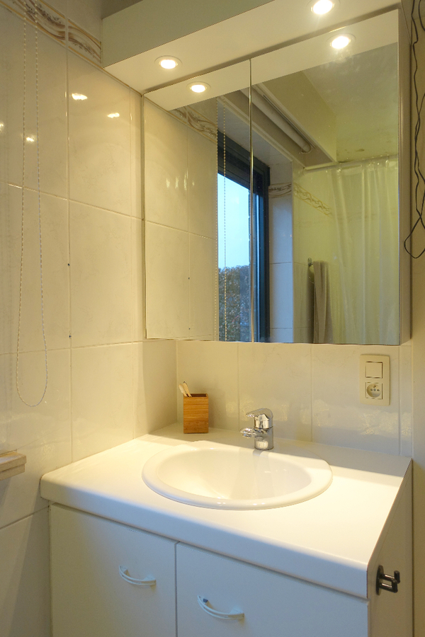 Gezellig gelijkvloersappartement met zonnige tuin en garage 