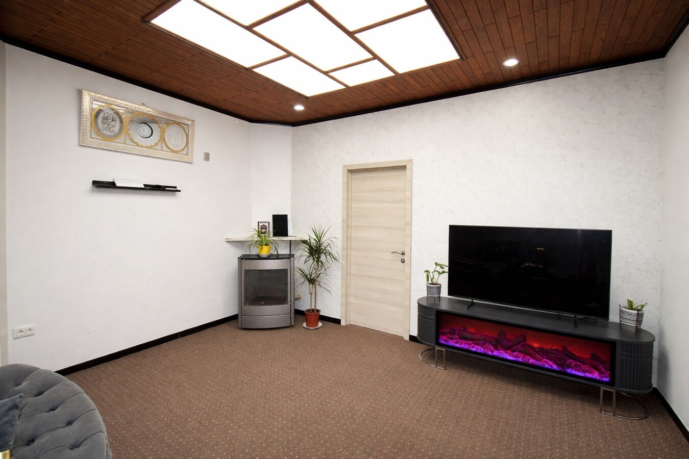 Centraal gelegen woning met drie slaapkamers, tuin én inpandige garage te koop in Sint-Niklaas! 