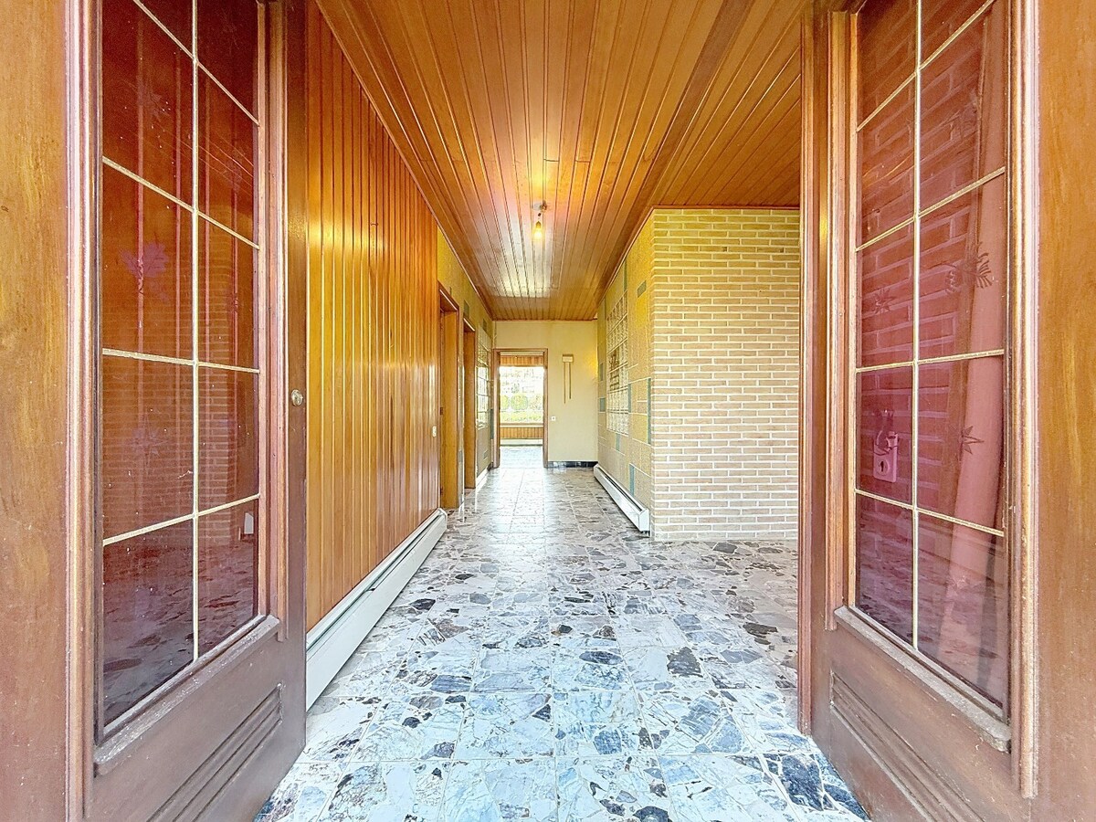 Statige laagbouwvilla met groene achteruit te Scheldewindeke 