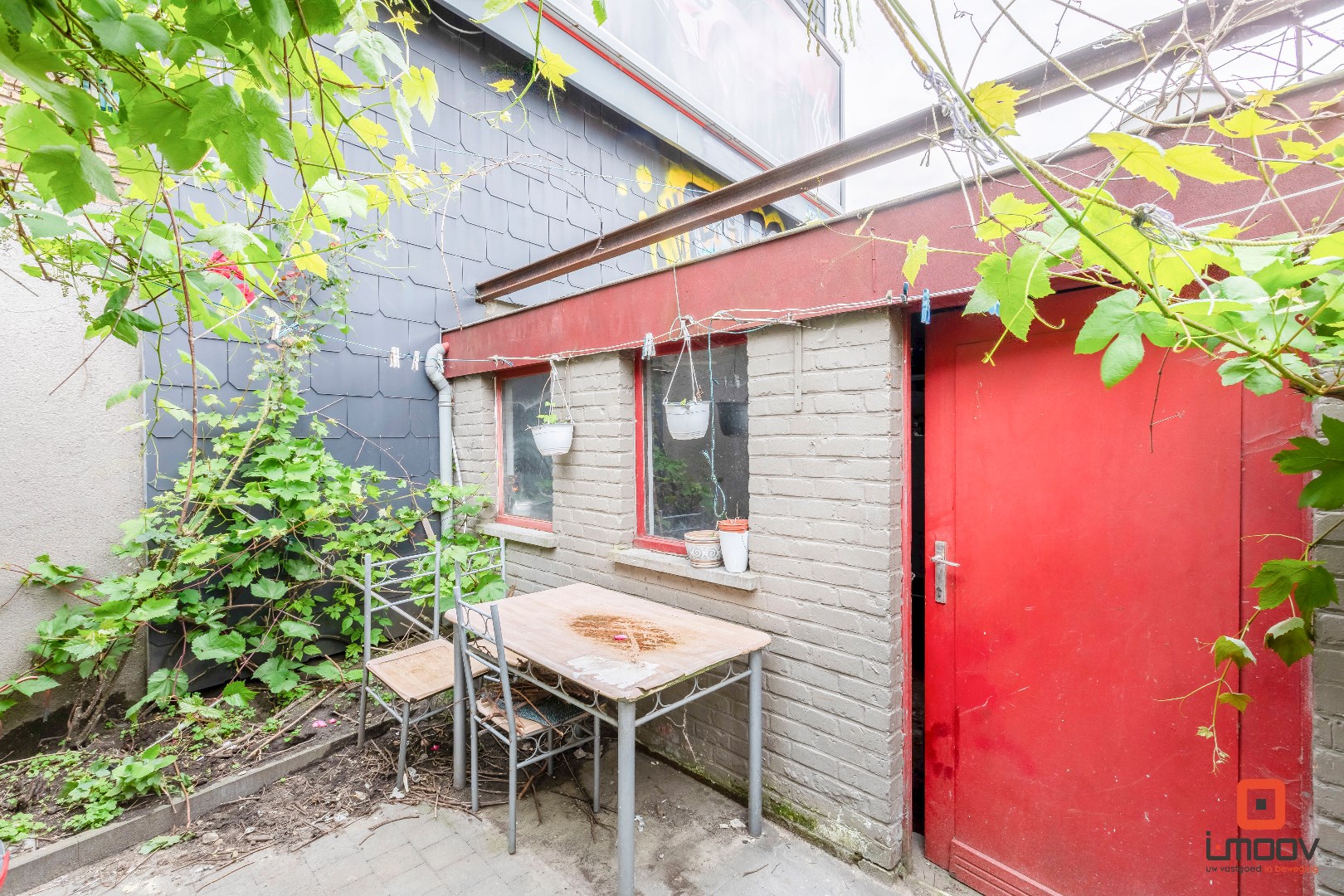 Ruime woning met 4 slaapkamers, koer en garage 