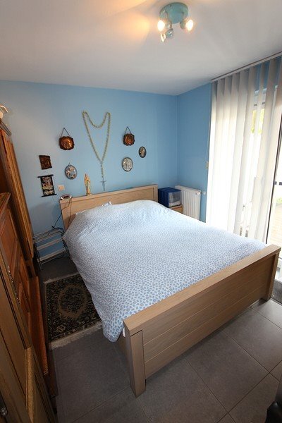 Gelijkvloers appartement met 2 slaapkamers en garage 