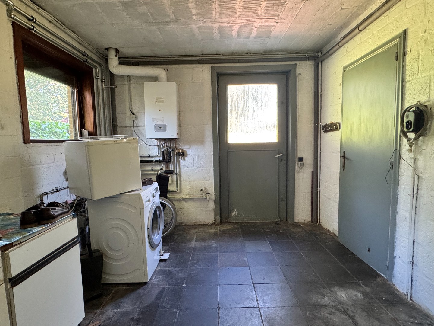 Open bebouwing met garage op een rustige, residentiële ligging 