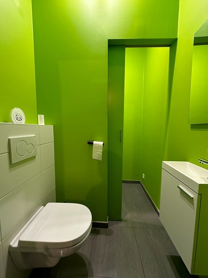 Opbrengsteigendom met 8 appartementen, 10 ondergrondse garageboxen. 