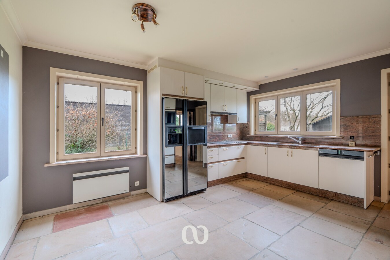 Karaktervolle en ruime woning met 3 slaapkamers en garage nabij het centrum van Oudenaarde 