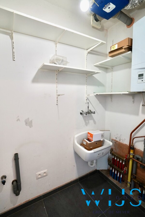 Instapklaar 2 slaapkamer appartement met garage ! 