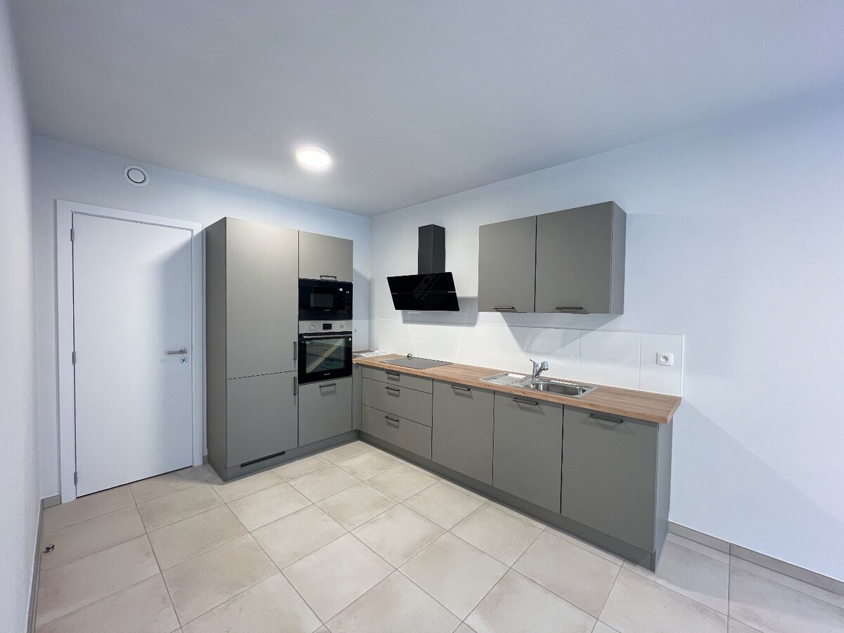 Superbe appartement 2 chambres avec terrasse et jardin 