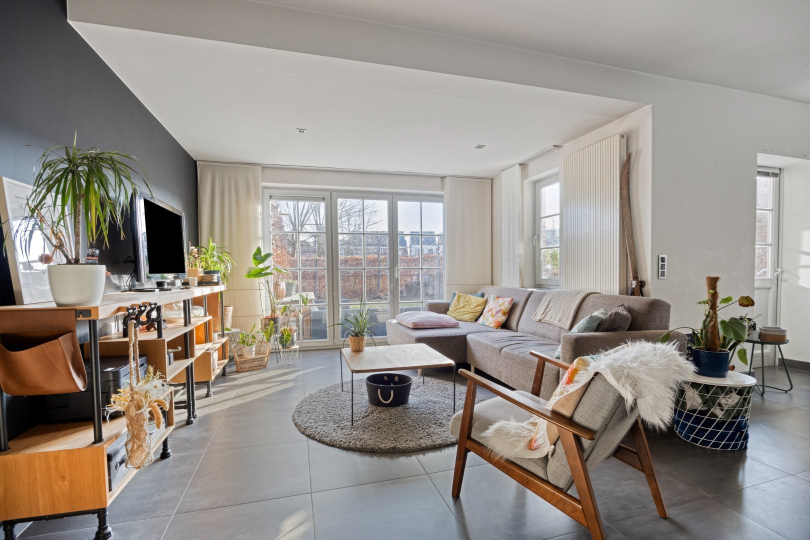 Luxueus gelijkvloers appartement met zuidgerichte tuin en garage in Tongerlo 