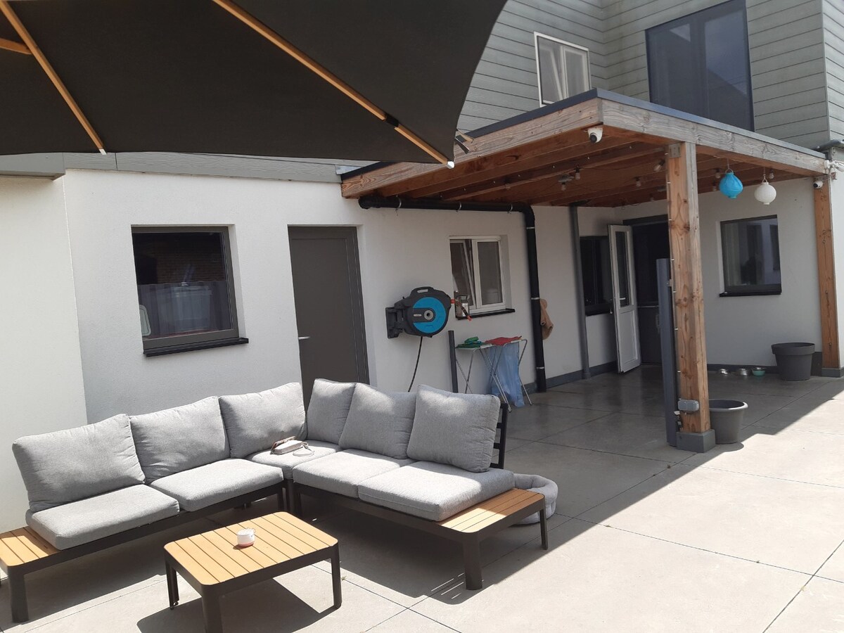 Praktische gezinswoning met leuke tuin. 