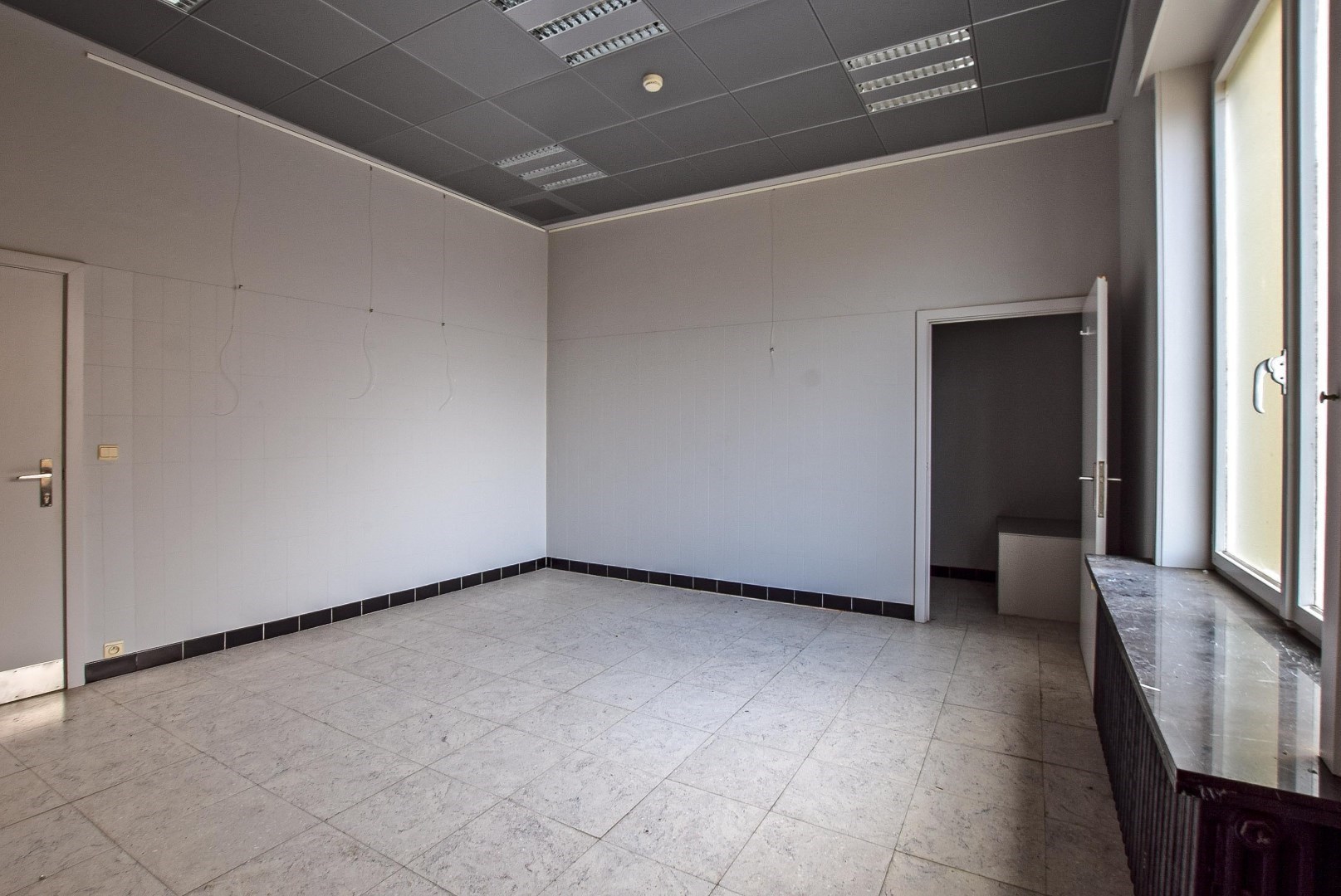 UNIEK ONTWIKKELINGSPROJECT IN HARTJE VEURNE - VOORMALIG BANKGEBOUW. 