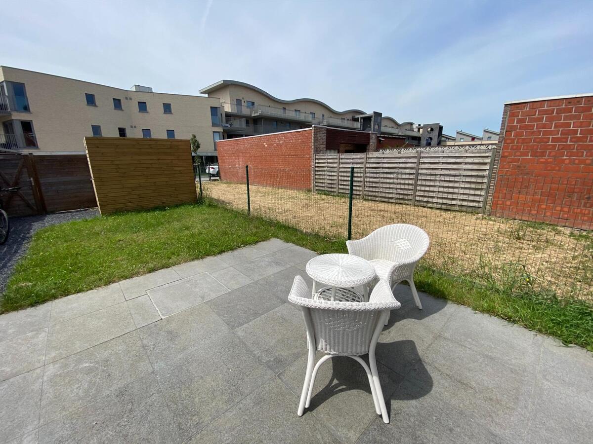 Gelijkvloersappartement met tuin en 2 autostaanplaatsen 