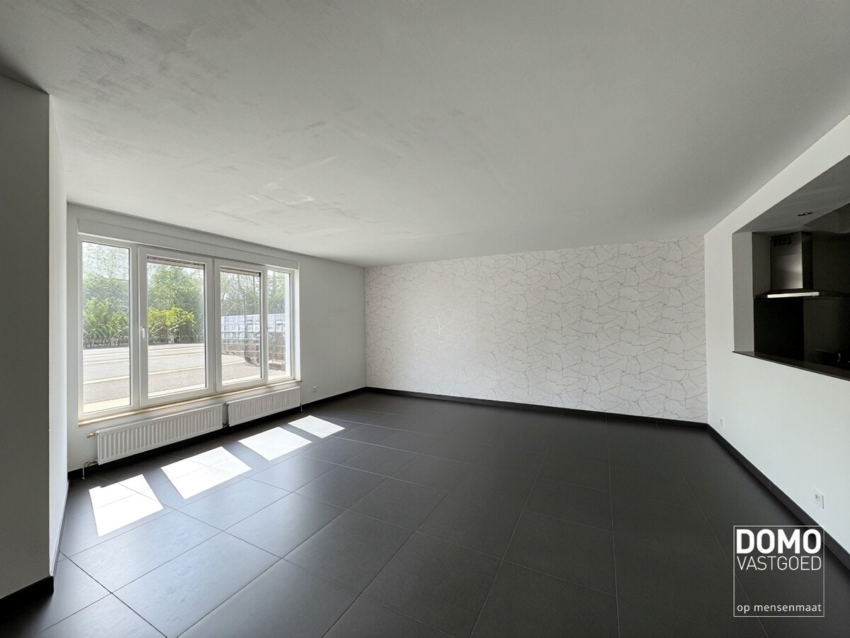 Gelijkvloers appartement met tuin en ondergrondse garage te Kermt - energielabel B -121m² bewoonbare oppervlakte 