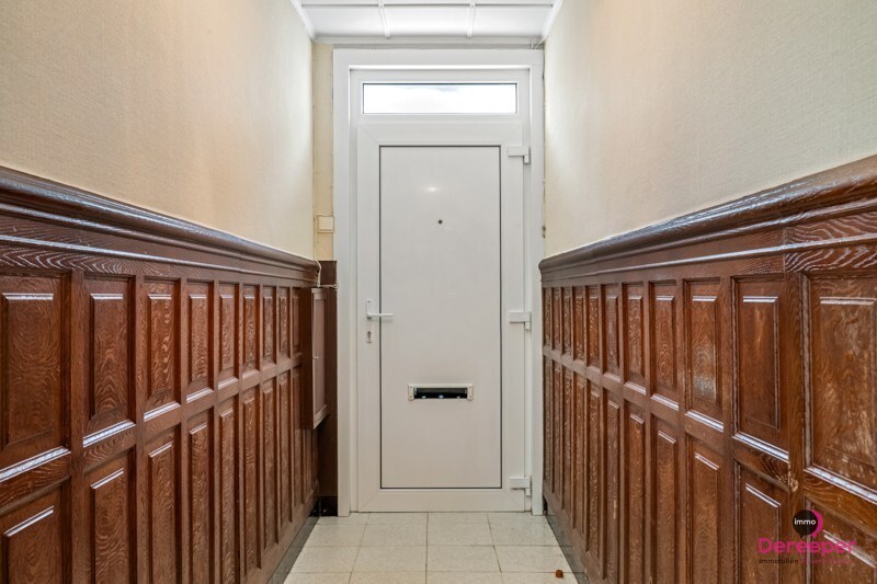 Te renoveren rijwoning op centrale ligging met leuke zuidgerichte tuin 