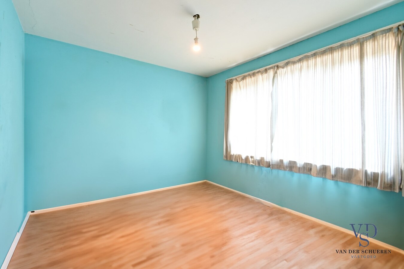 Woning met tuin - te renoveren. 