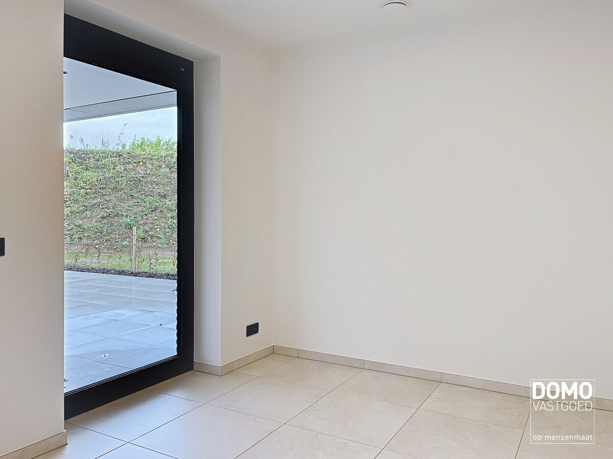 Modern gelijkvloers appartement gelegen te Kermt - 2 slaapkamers - energiezuinig - ruim terras 