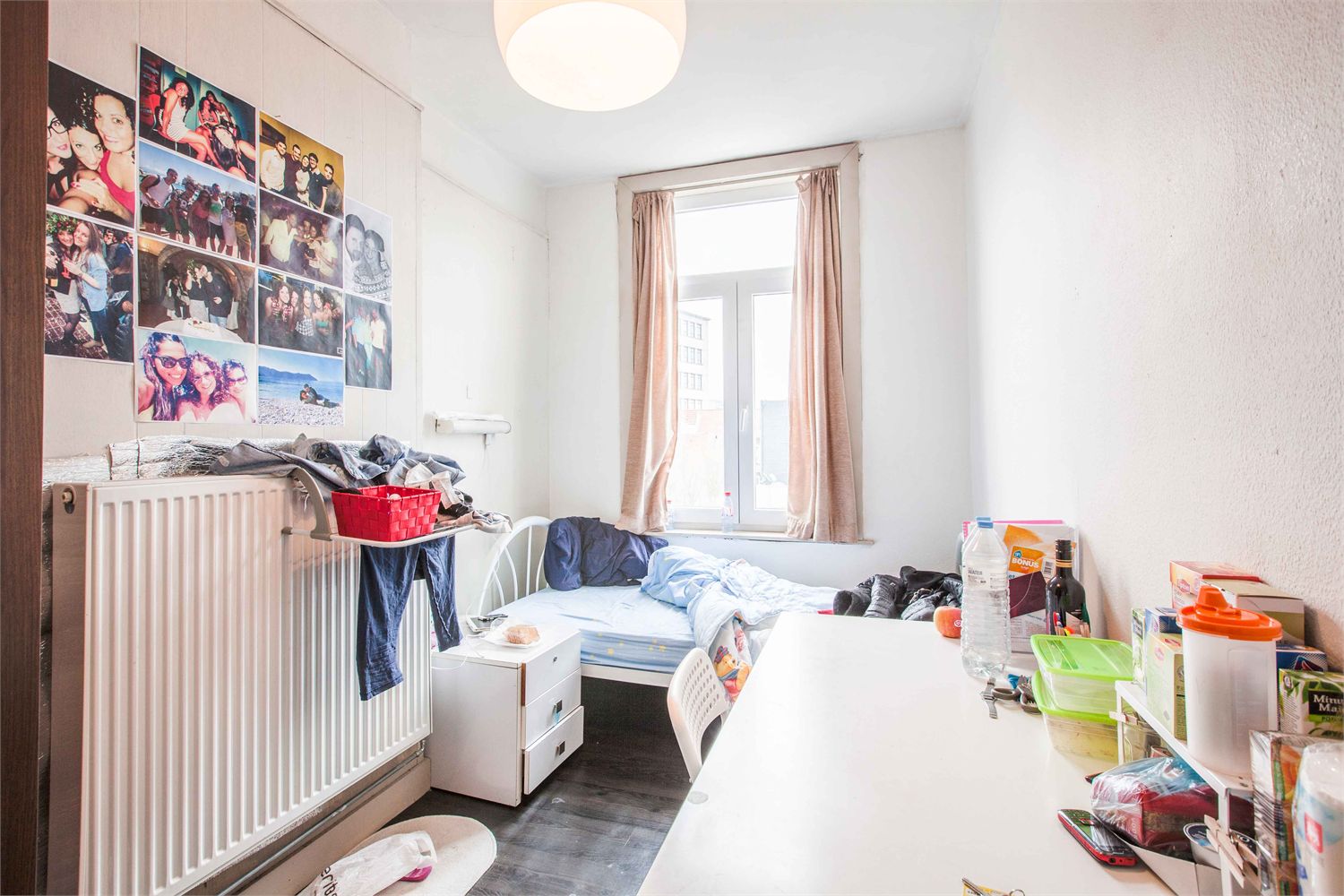 Ideaal gelegen studentenhuis bestaande uit 9 kamers en 2 studio's! 