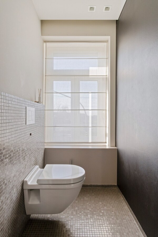 Uitzonderlijke exclusieve herenwoning met verrassende loods van 3 etages 