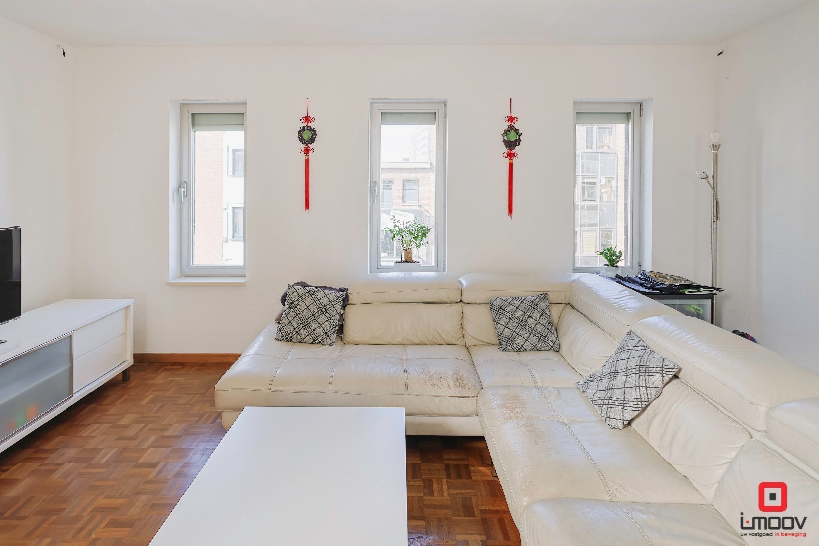 Lichtrijk en huiselijk triplexappartement met 4 slaapkamers en 2 garages te Gent 