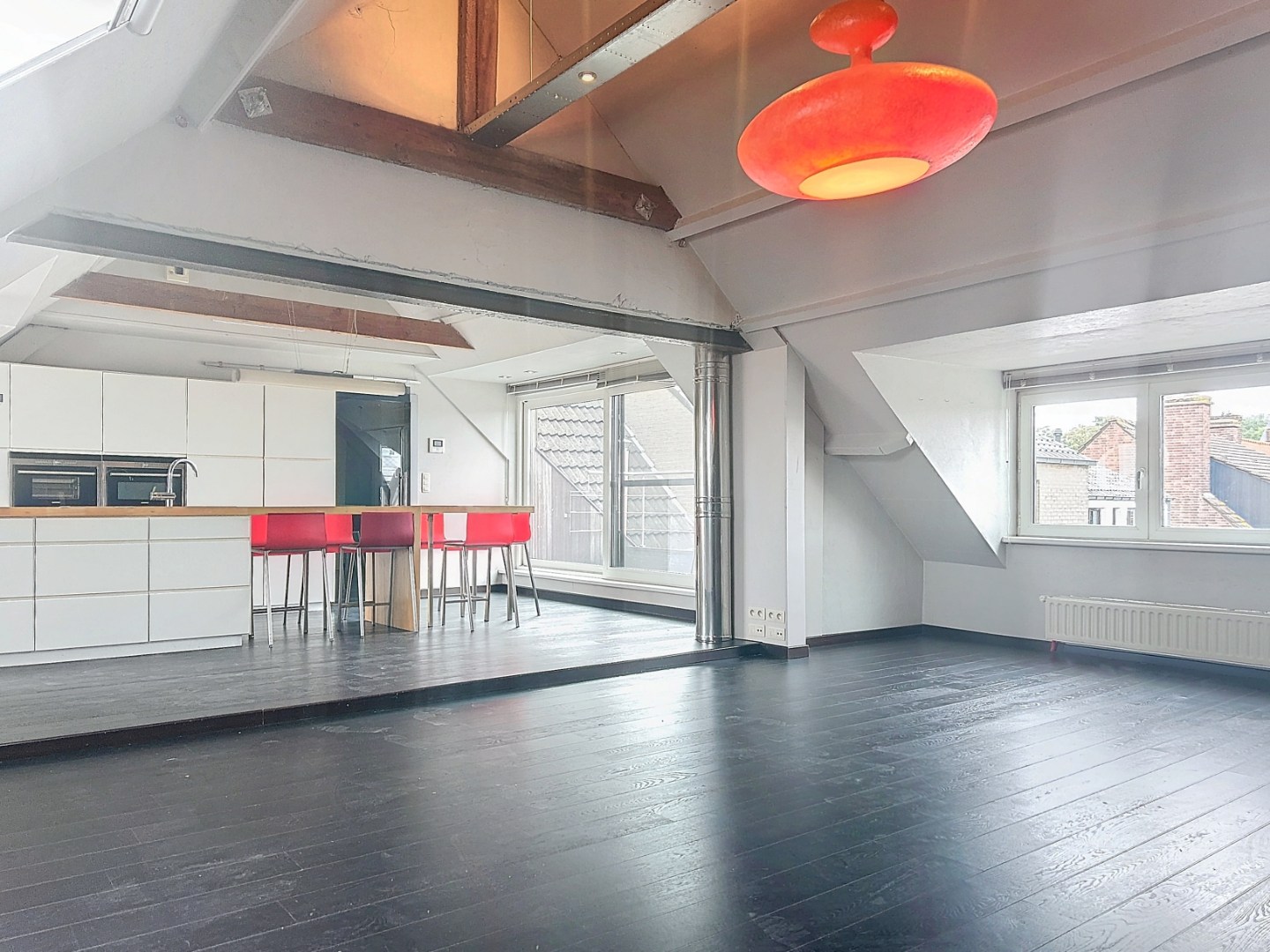 Opbrengsteigendom bestaande uit 3 appartementen + handelsgelijkvloers gelegen in het centrum 