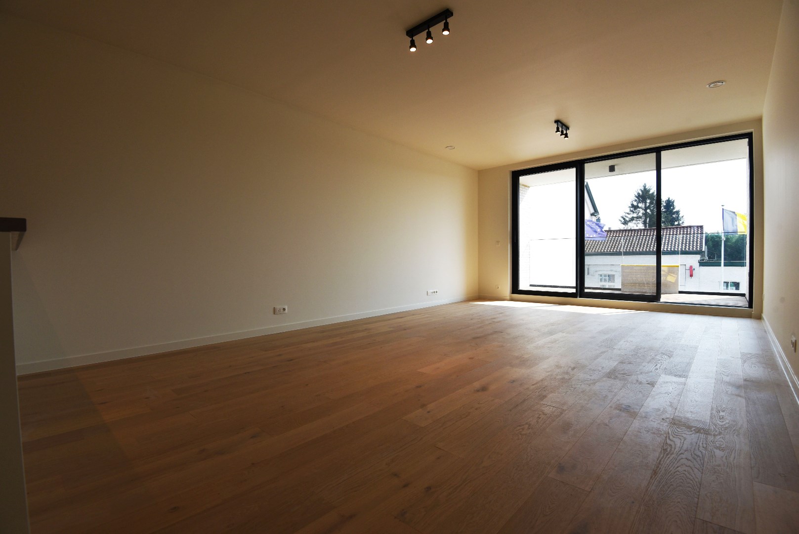 Nieuwbouwappartement met 2 slpks, autostaanplaats en terras te Maldegem centrum 