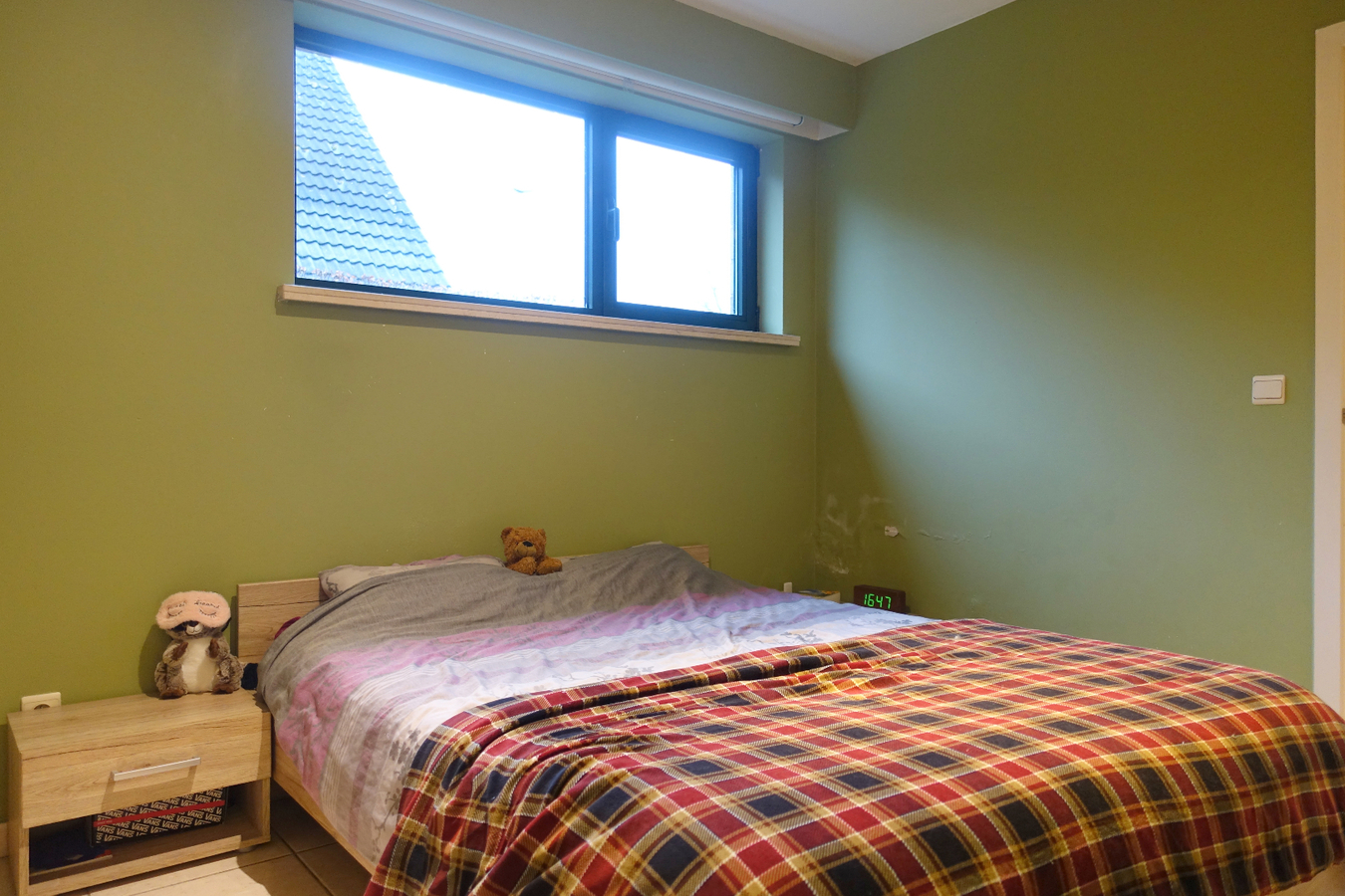 Gezellig gelijkvloersappartement met zonnige tuin en garage 