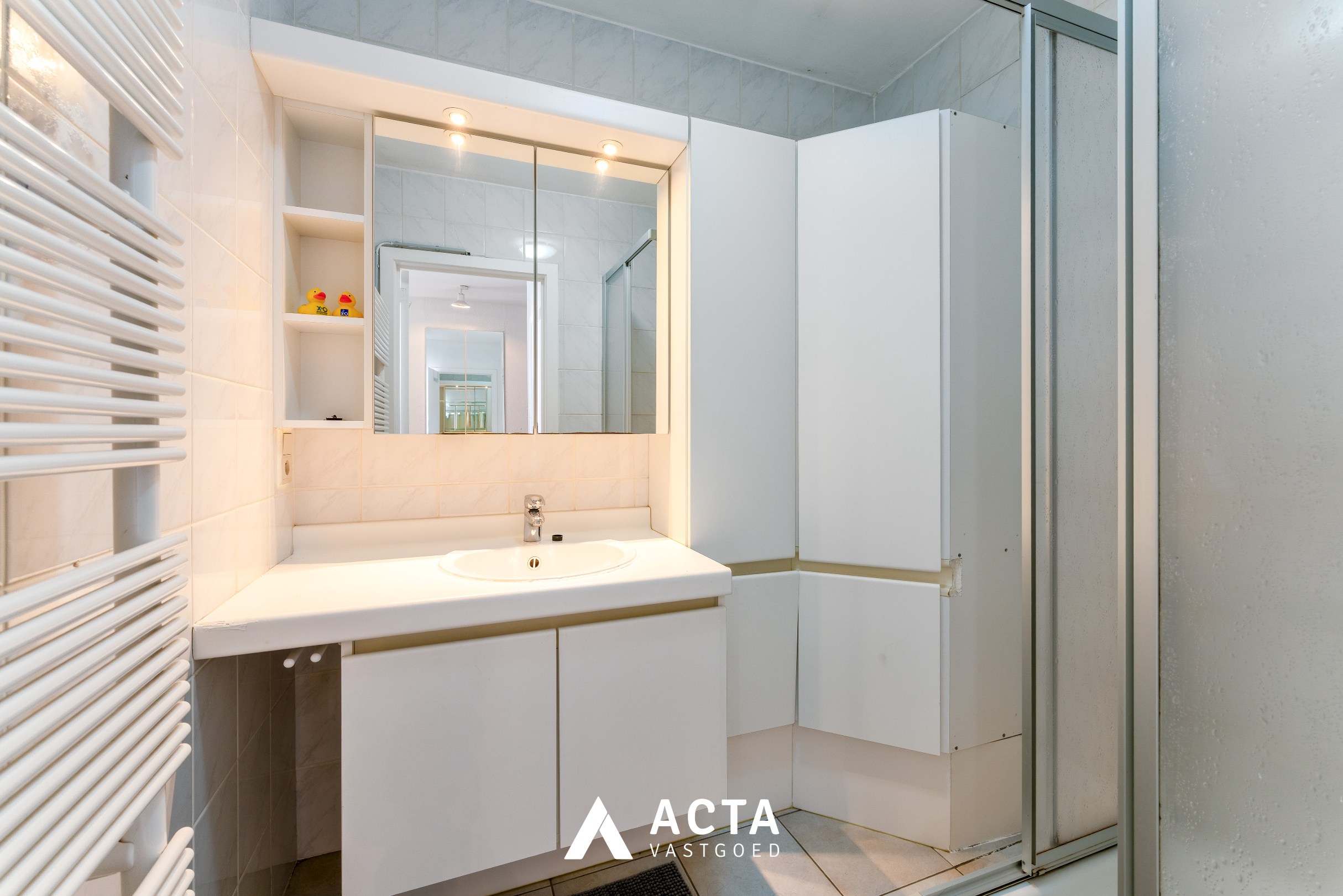 Gelijkvloers 3-slpk-appartement+tuin in Mariakerke 