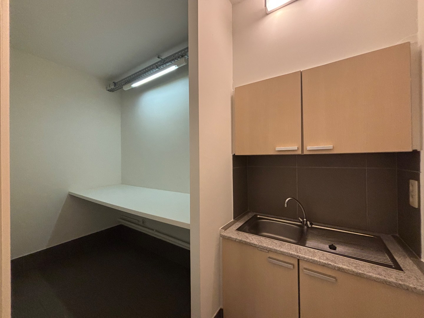 Opbrengsteigendom met 7 appartementen &amp; ruim handelspand in Mol-centrum 