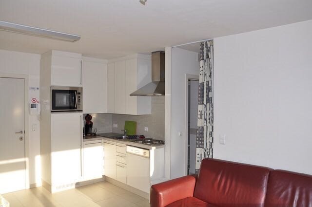 Modern 1 slaapkamerappartement op een boogscheut van het strand 