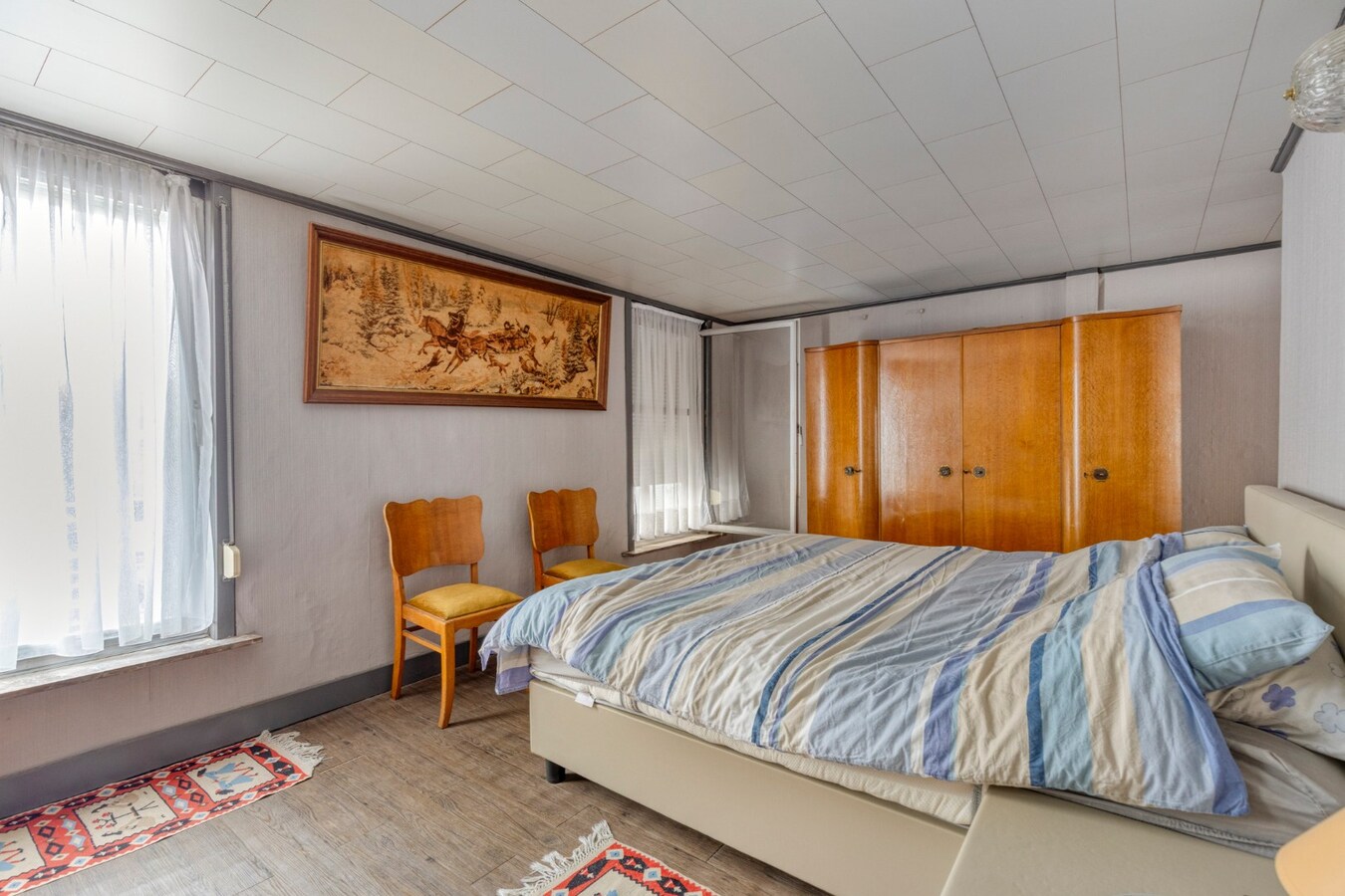 Centraal gelegen woning met stadstuin en veel potentieel in Ronse 