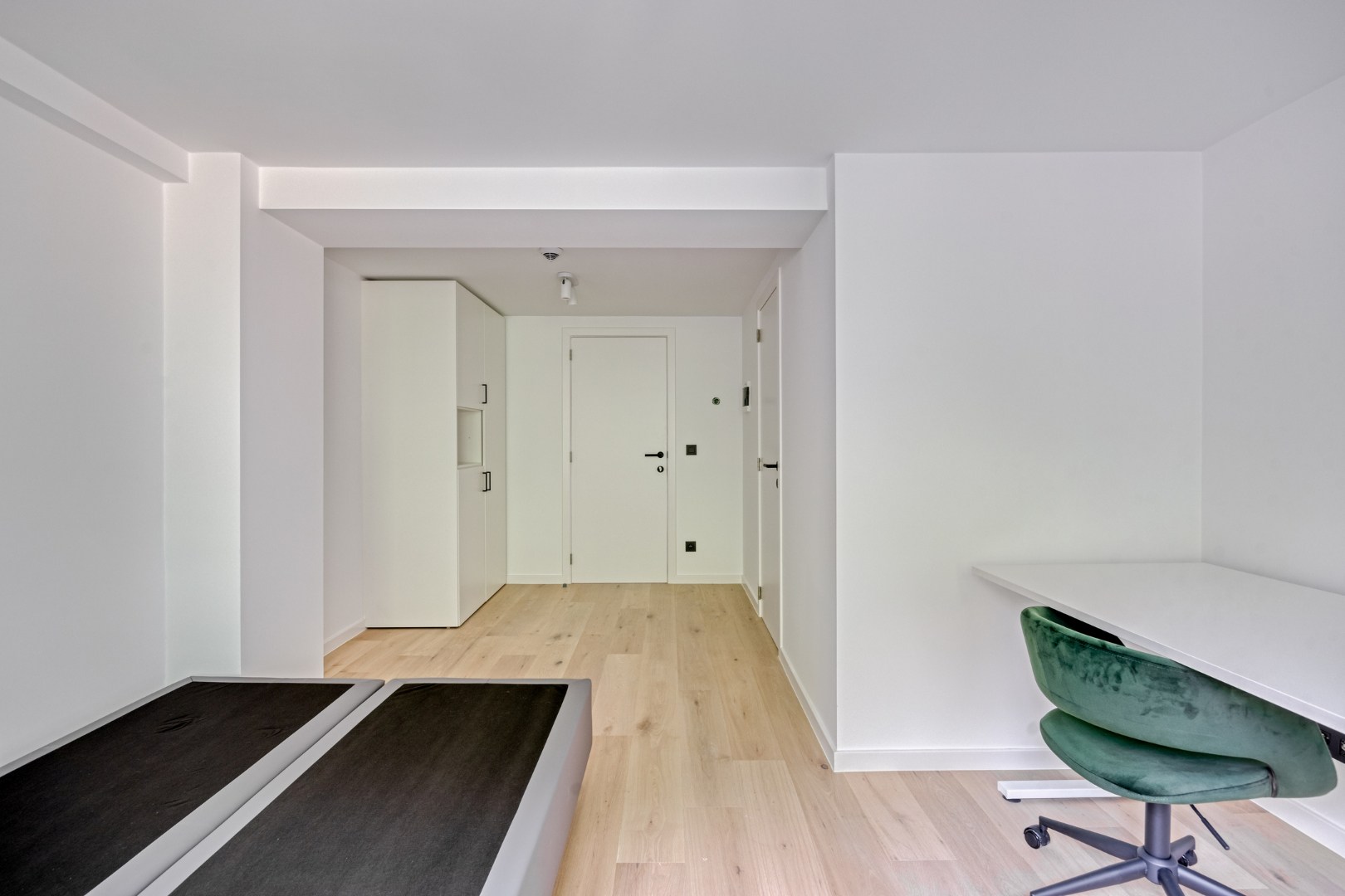 Volledig gerenoveerde studentenkamer in residentie met 15 studentenkamers en een 1slaapkamer appartement in hartje Leuven - EPC label A! 