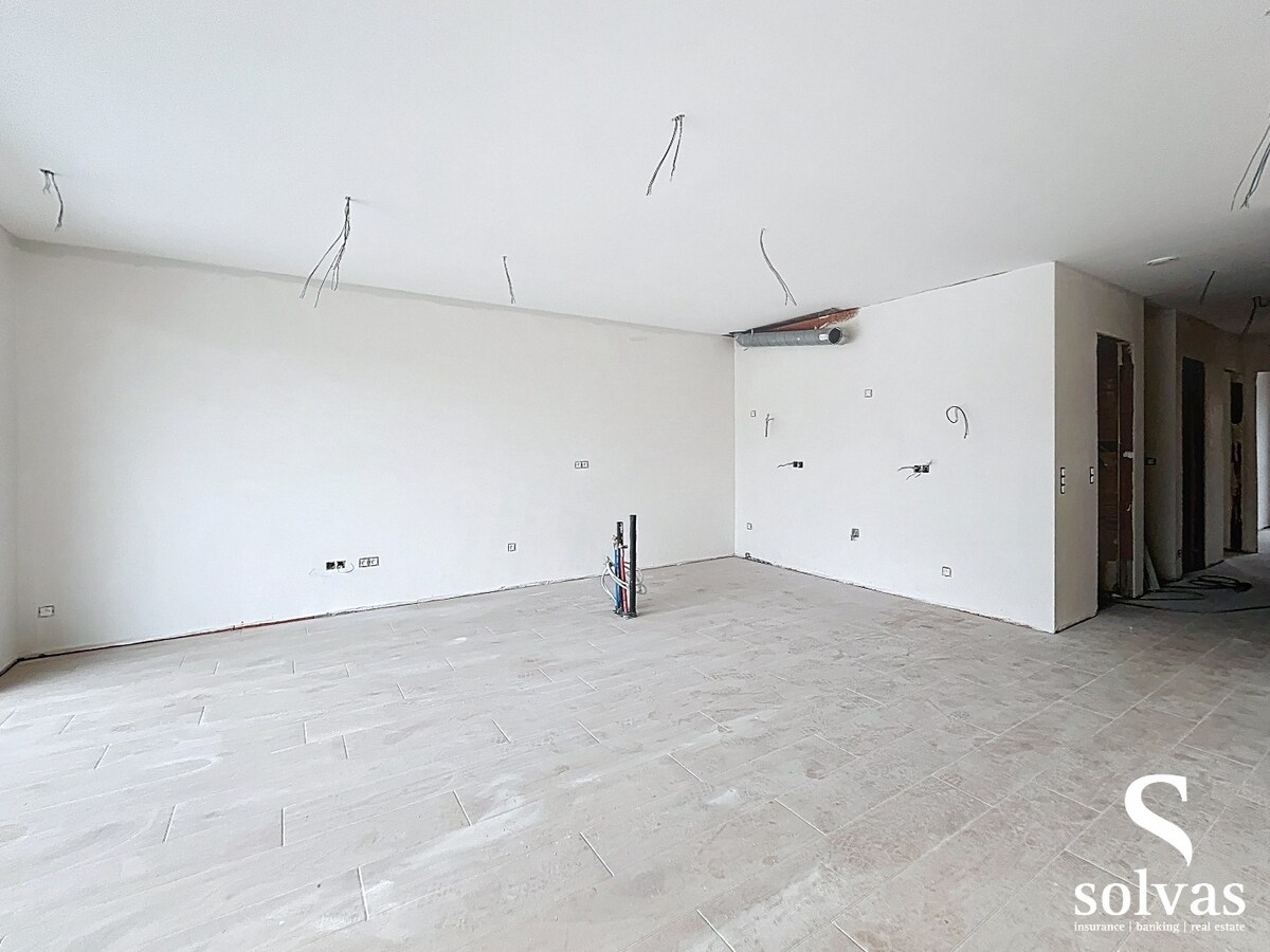 Ruim gelijkvloers nieuwbouw appartement met tuin in hartje Aalter 