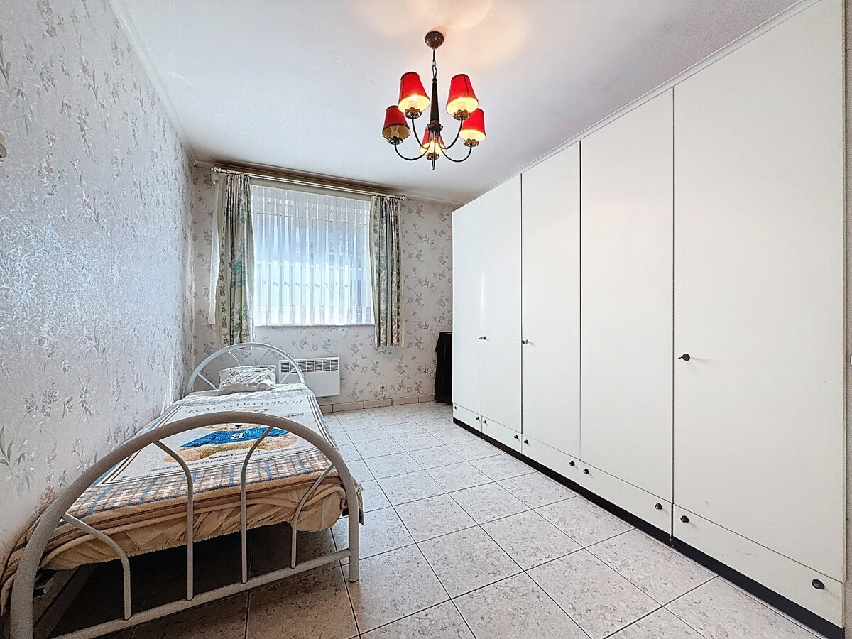 Energiezuinig gelijkvloersapp. met tuintje en garage te centrum Wetteren 