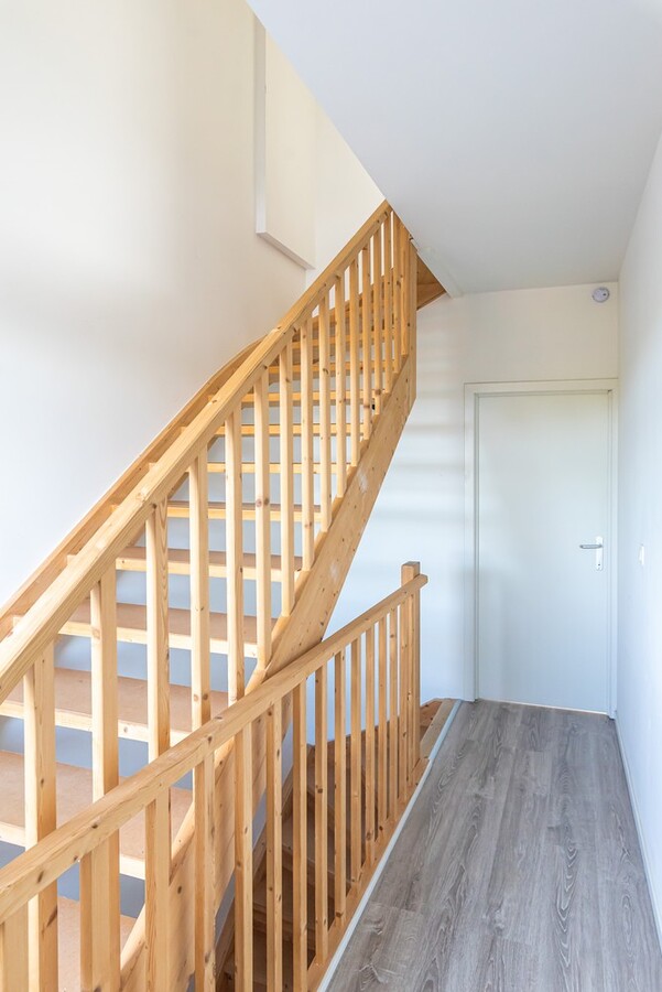 Tof ingerichte gezinwoning met privé-parking 