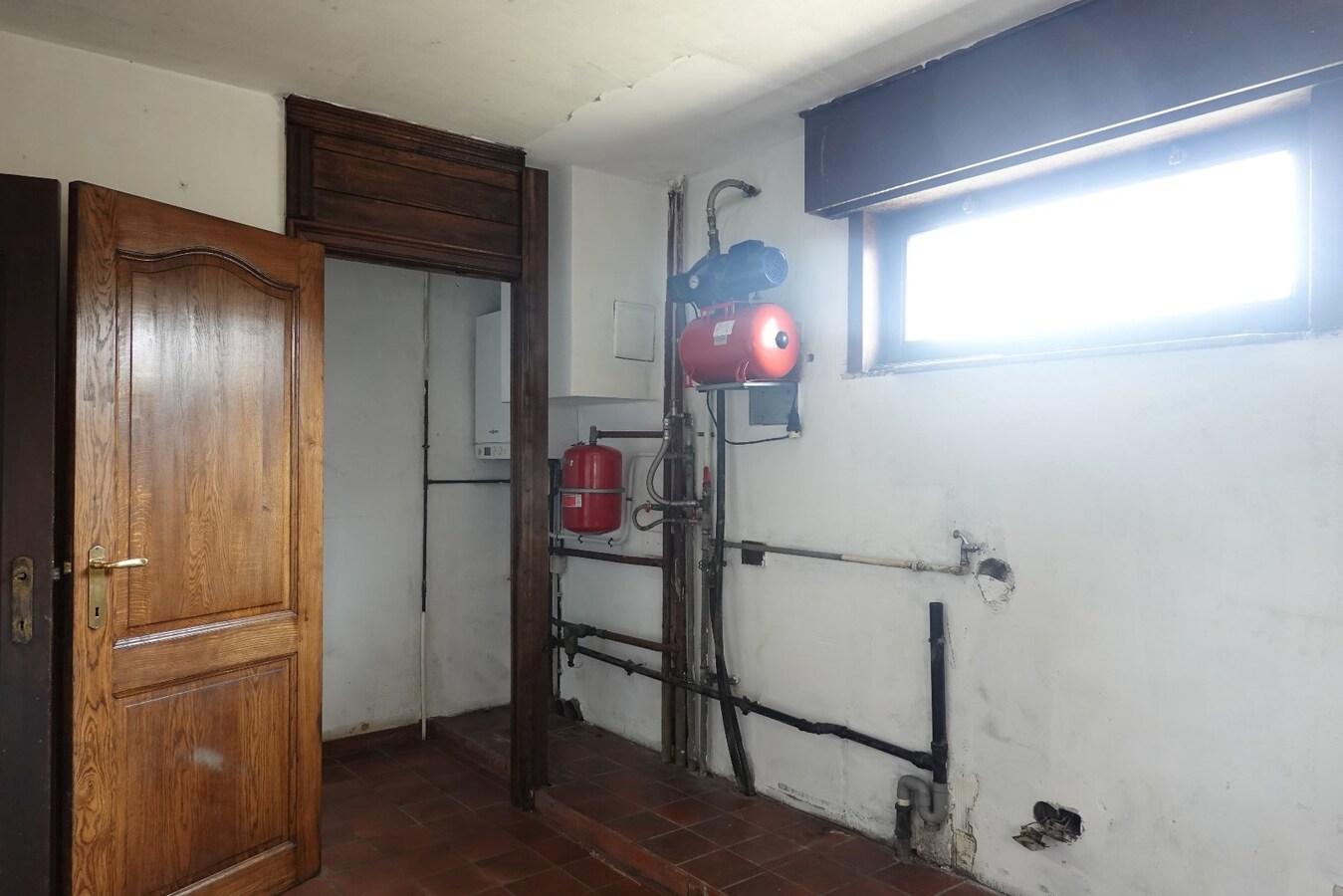 Te renoveren villa in bedrijventerreinzone voor KMO's 