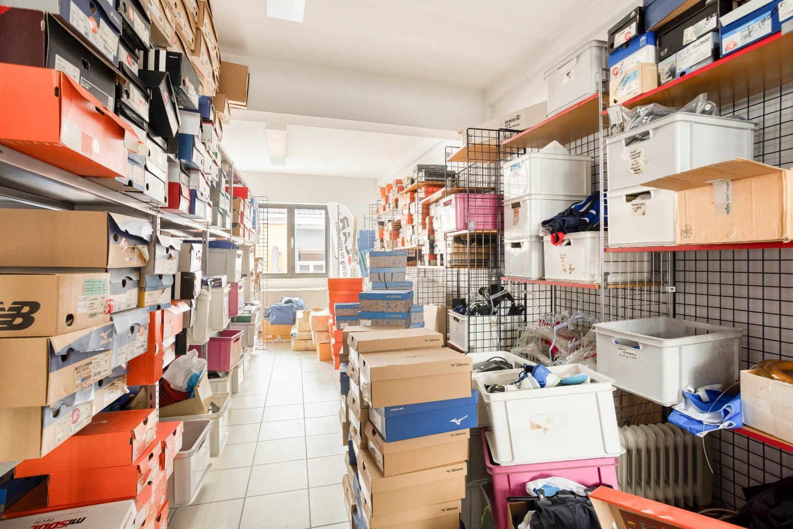 Handelspand met woonst te Halle-centrum 