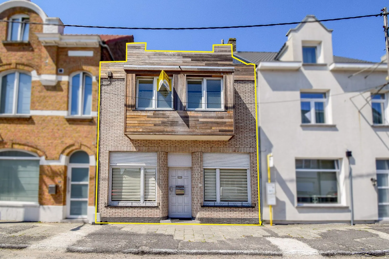 Gezellige rijwoning met achterliggende tuin en garage te Lombardsijde