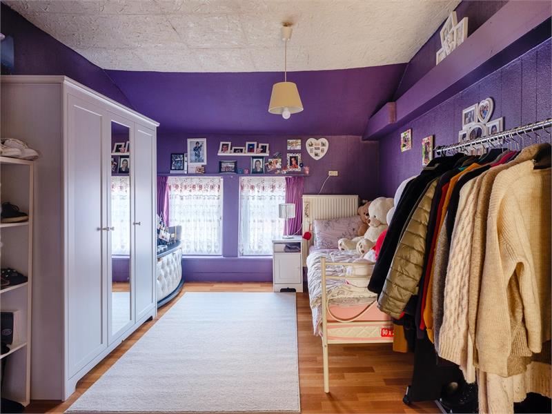 Rijwoning met 4 slaapkamers en ruim terras 