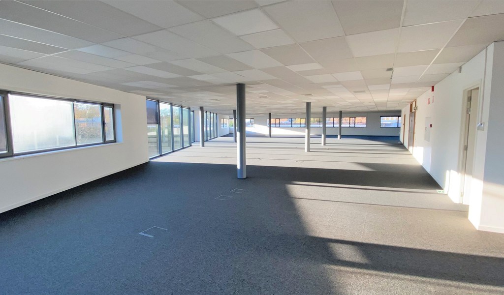 Opbrengsteigendom te koop langs E40 in Merelbeke-Melle