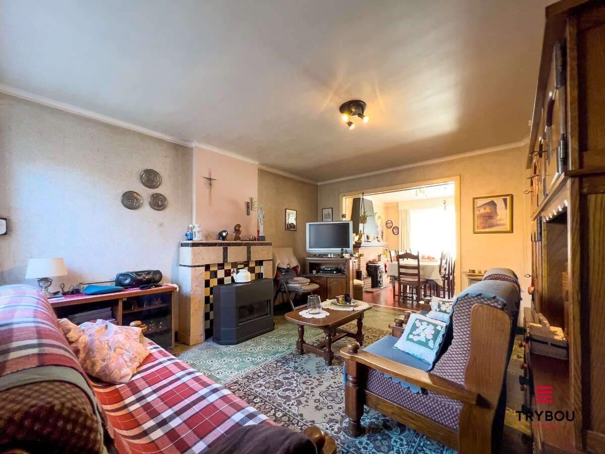 Ruime gezinswoning met 4 slaapkamers, garage en tuin 