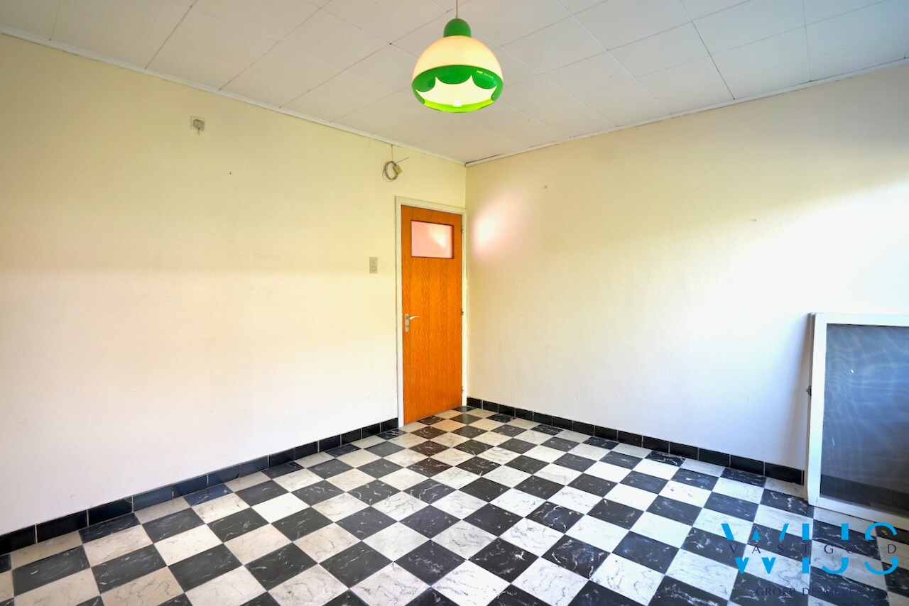 Open bebouwing op ruim perceel van 892m² te Ertvelde ! 