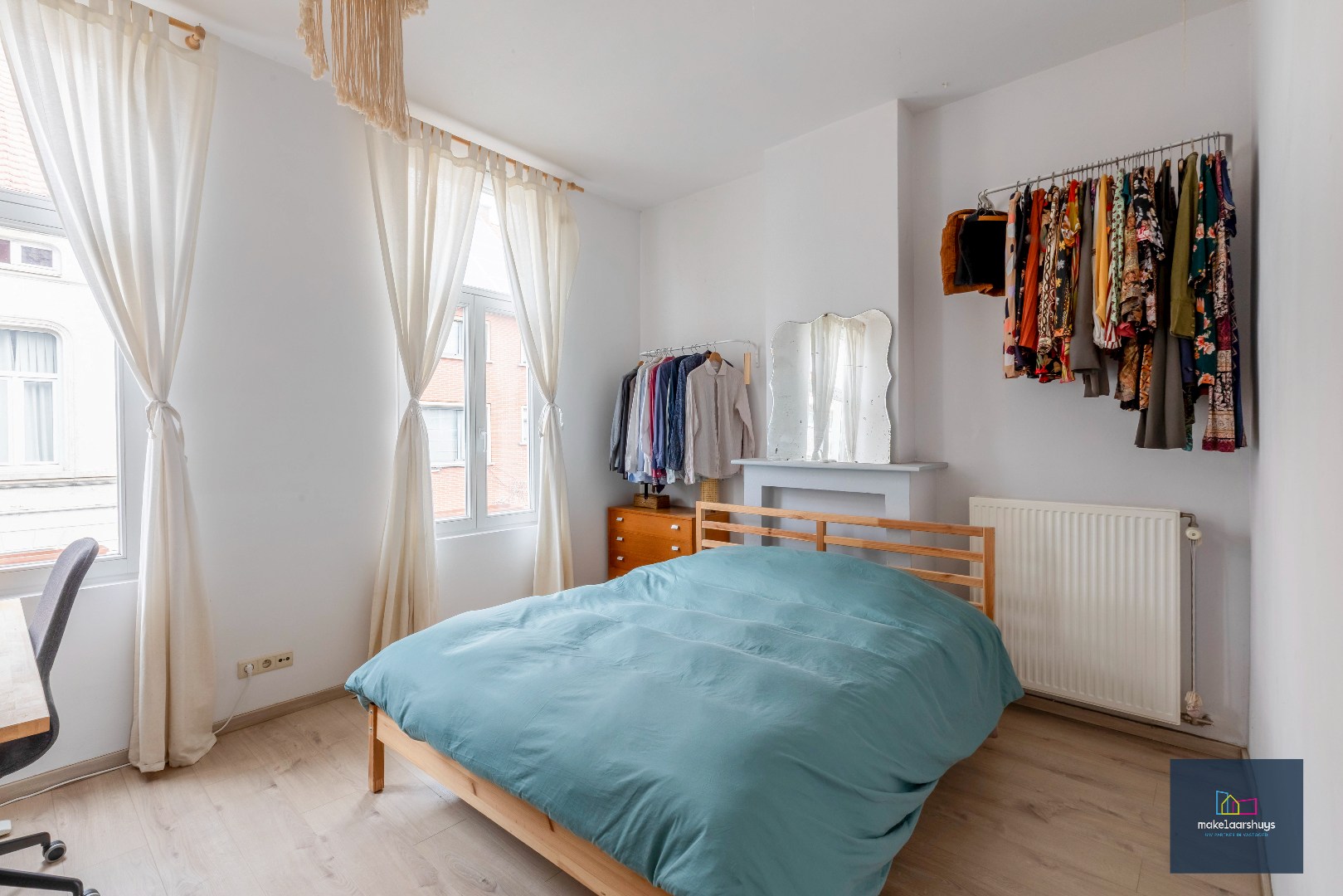 Instapklare woning met zuidgerichte tuin nabij centrum Gent 