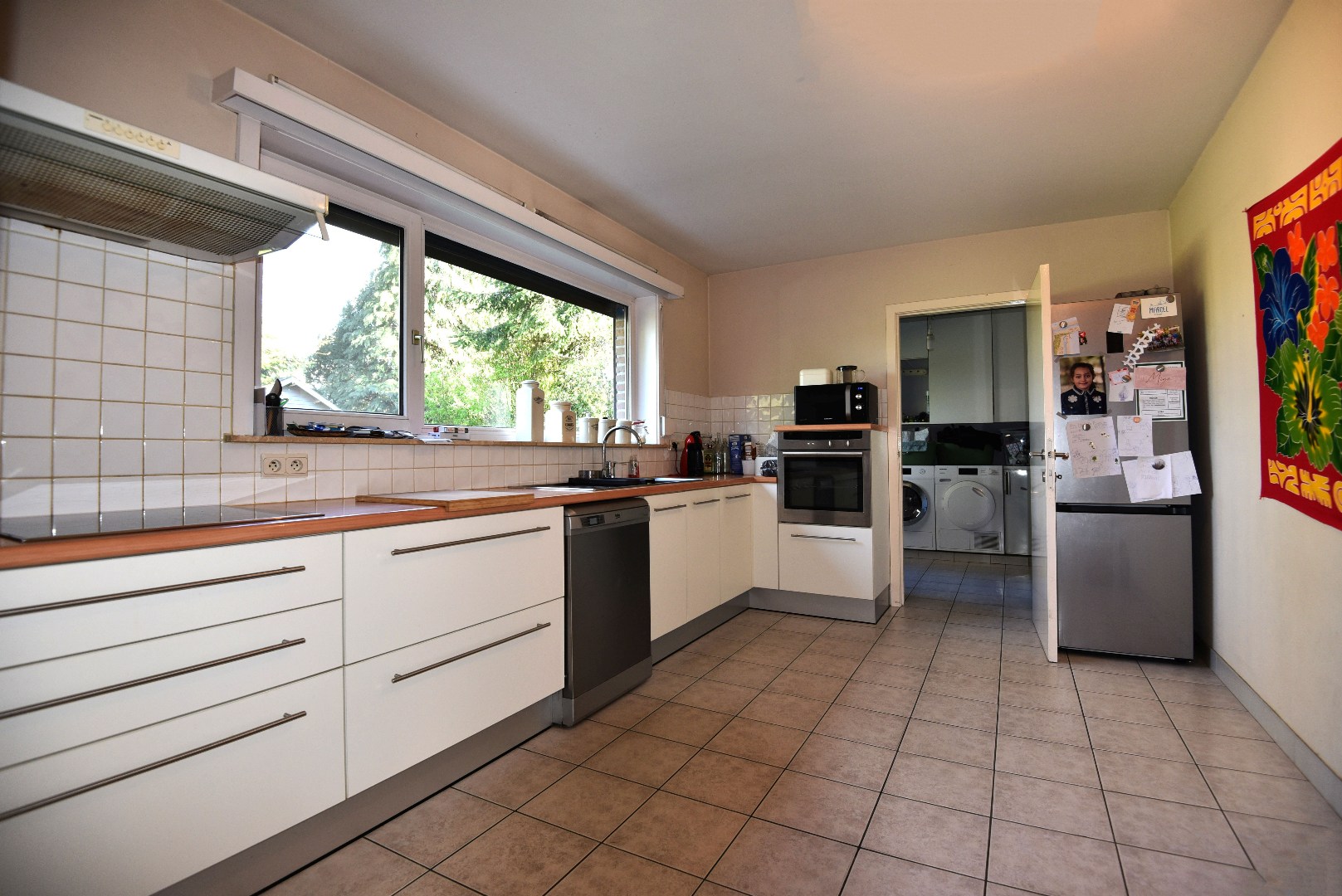 Open bebouwing met 3 slpks, dubbele garage en tuin te Eeklo 