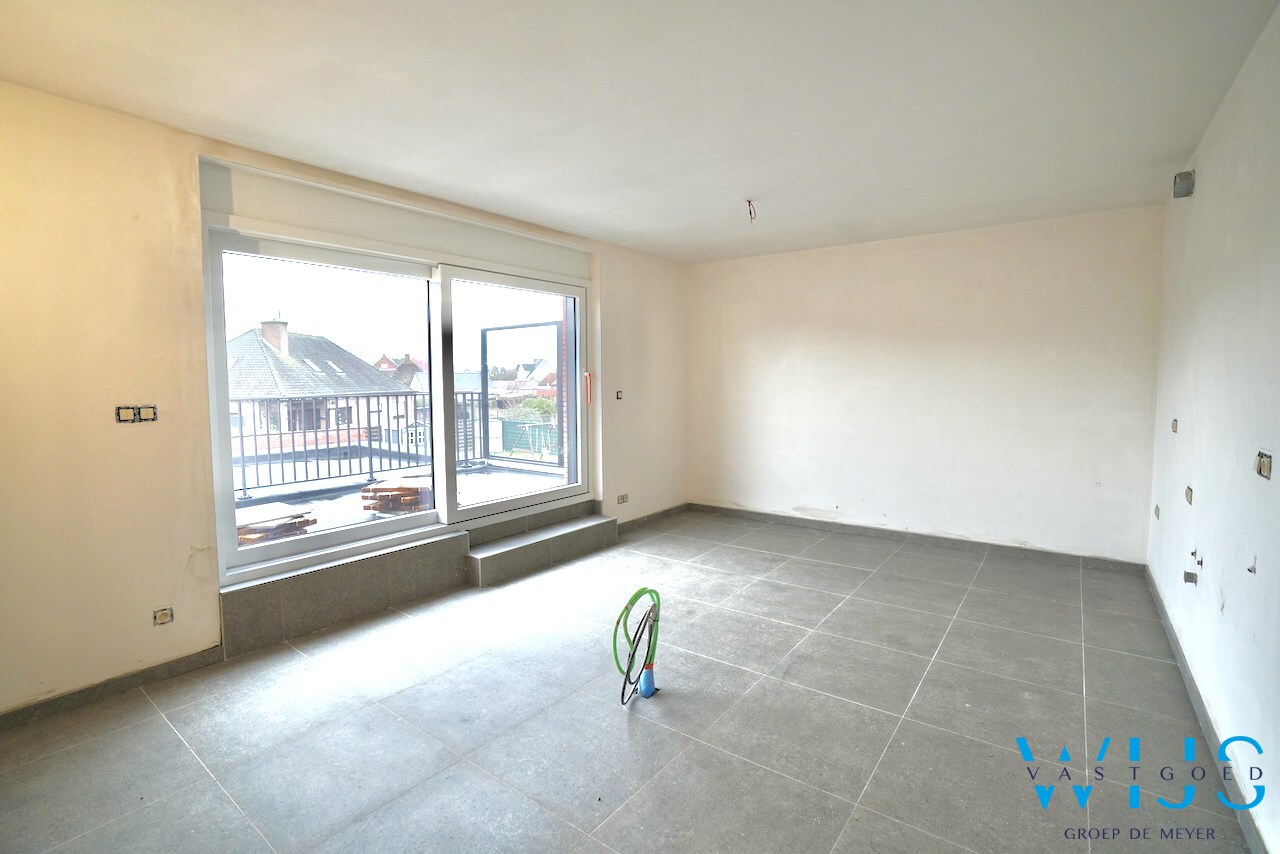 Drieslaapkamer appartement met garage in hartje Ertvelde ! 