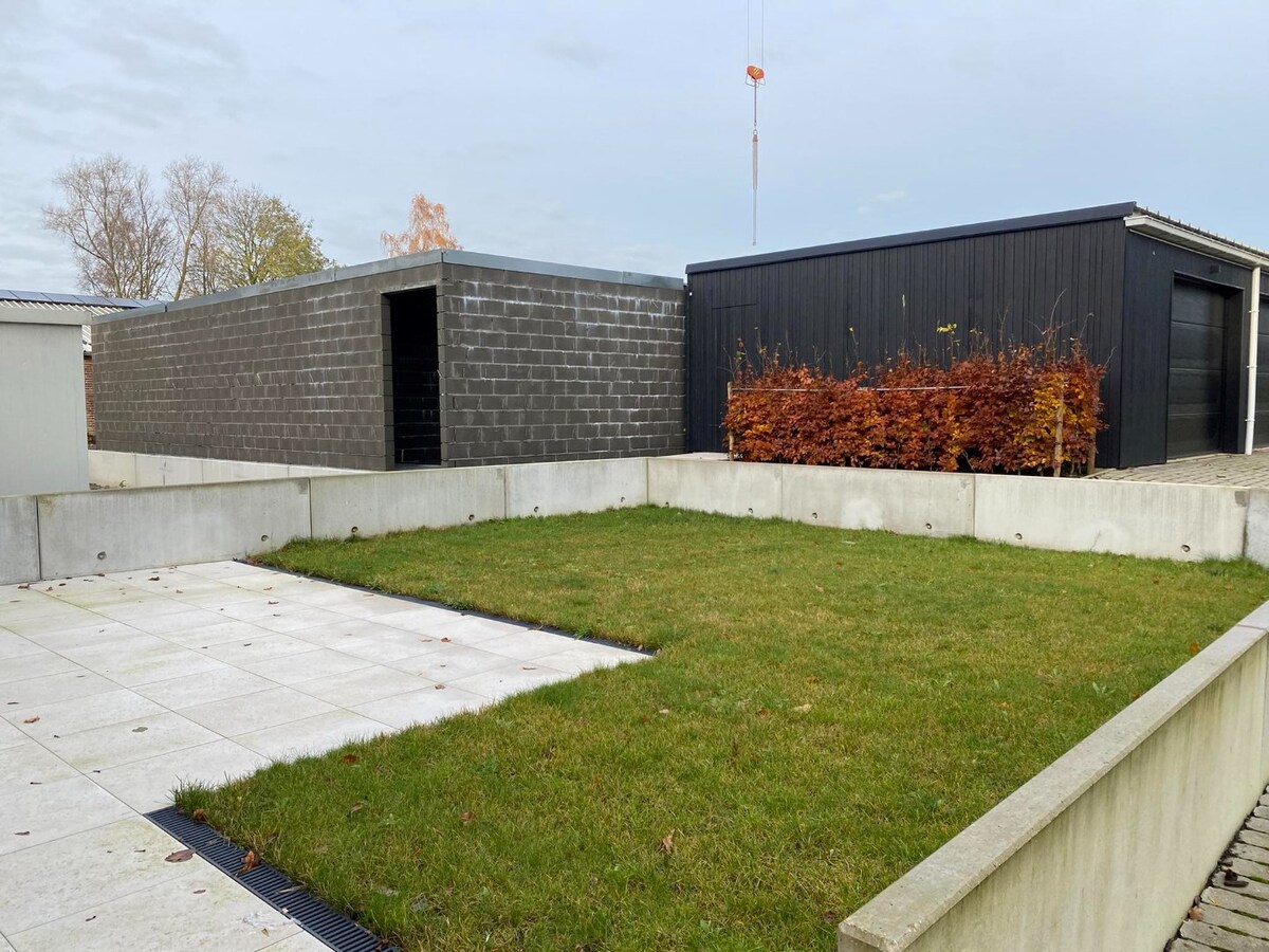 Gelijkvloersappartement met 3 slaapkamers en zongericht terras + tuin 