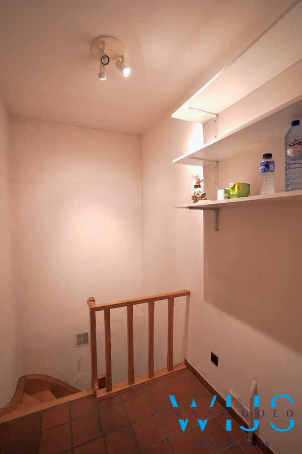 Fantastische open bebouwing met dubbele garage in gegeerde woonwijk te Evergem 