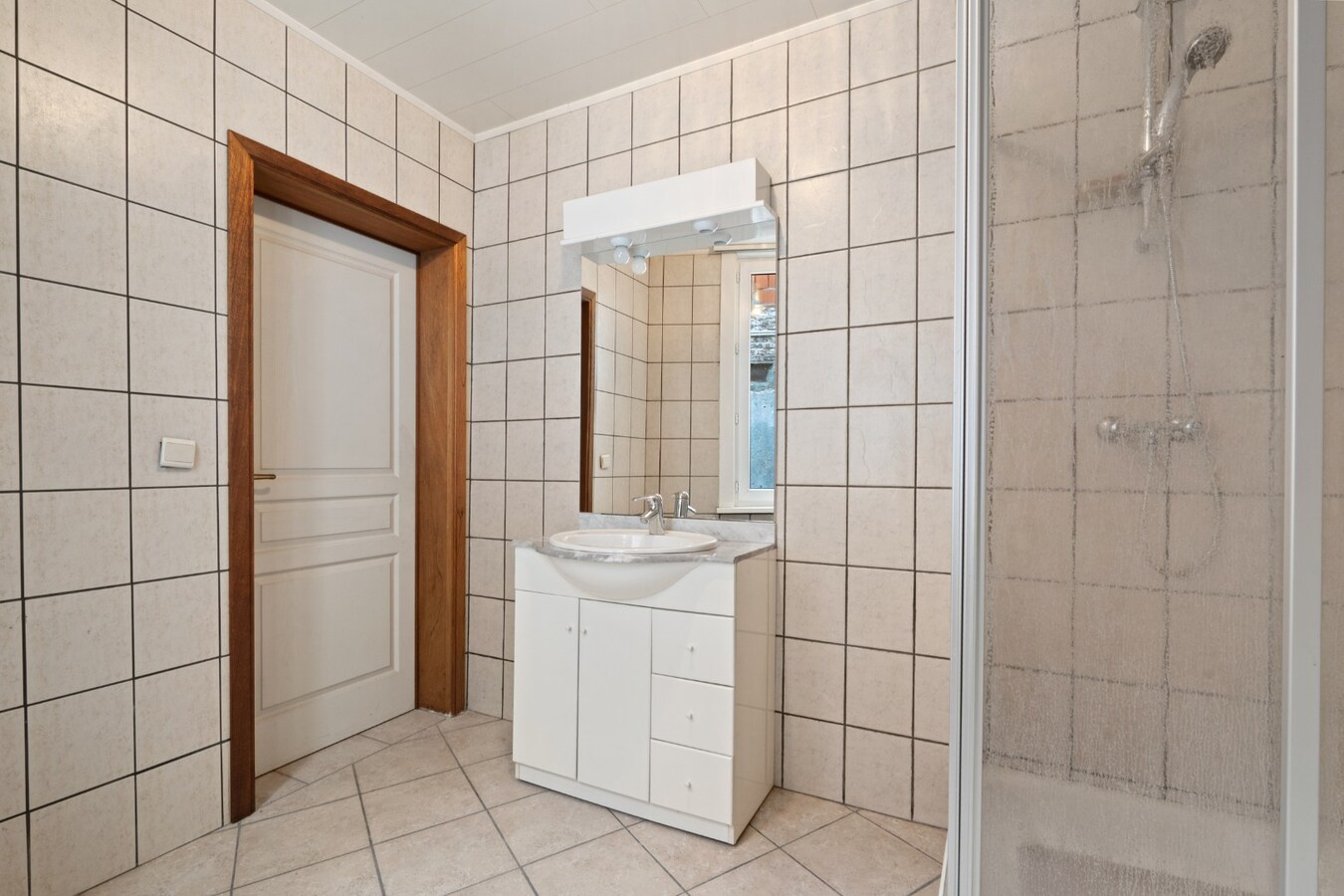 Handelswoning in centrum Zomergem! 